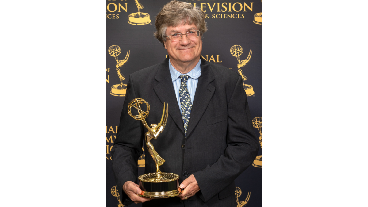 James W. Porter with his Emmy award in 2018. 