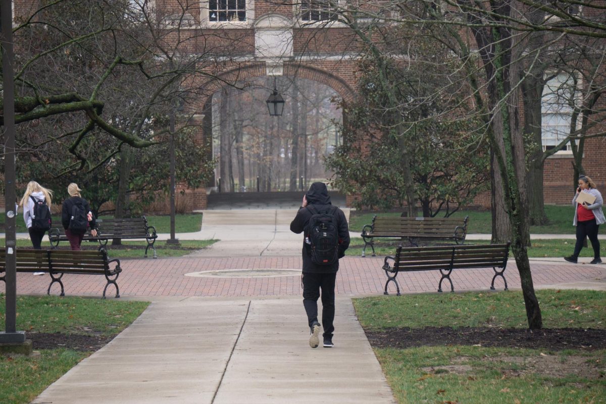 A man walking on campus on March 6.