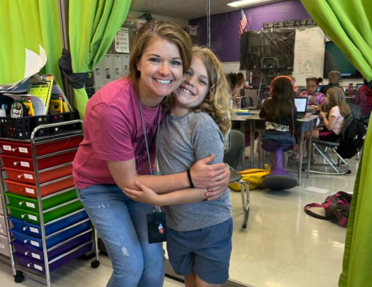 Kuhl smiles with a third grade student in her classroom. “I want my kids to feel safe to make mistakes, because you can’t learn unless you’re willing to make a mistake,” Kuhl said. Photo provided by the Greater Oxford Community Foundation.