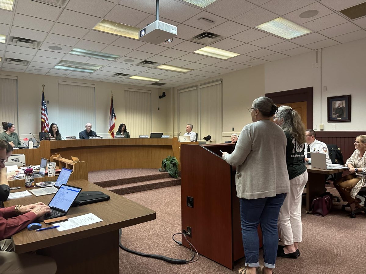 Executive Director Sherry Martin and Board Secretary Suzy Hummel deliver their annual report to Oxford City Council on May 7.