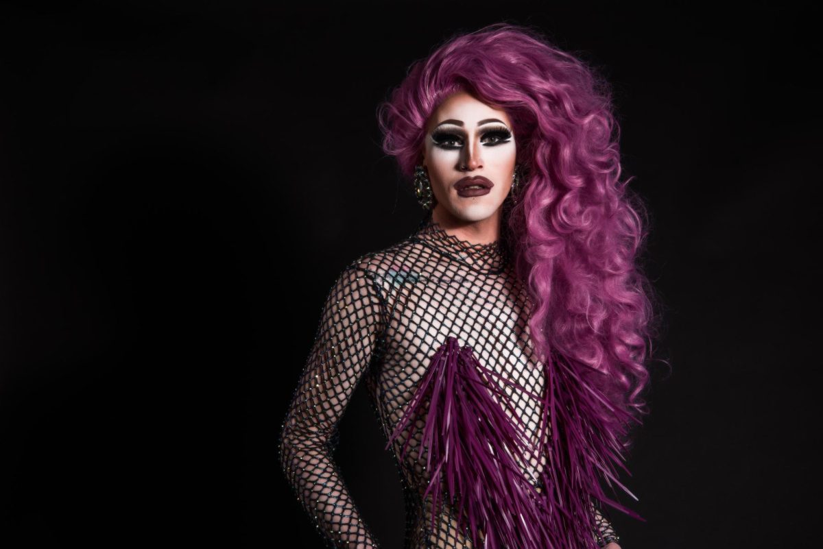 Drag queen P.H. Dee performs for National Coming Out Day