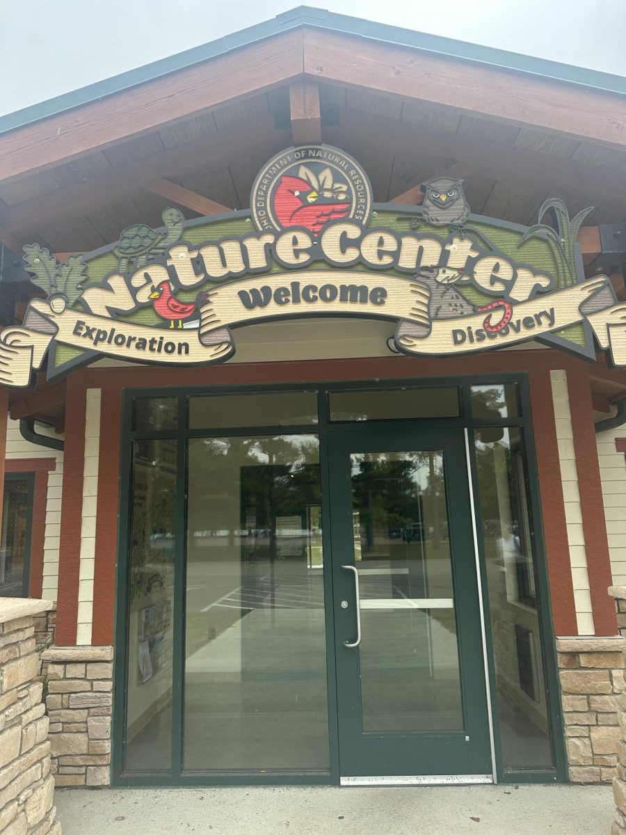 Within Hueston Woods State Park, visitors can find the nature center with a large sign displayed above the door. 
