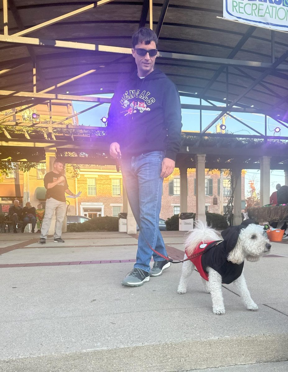 Dog, Lucy, dressed as Mickey Mouse, walked across the stage and greeted the viewers 