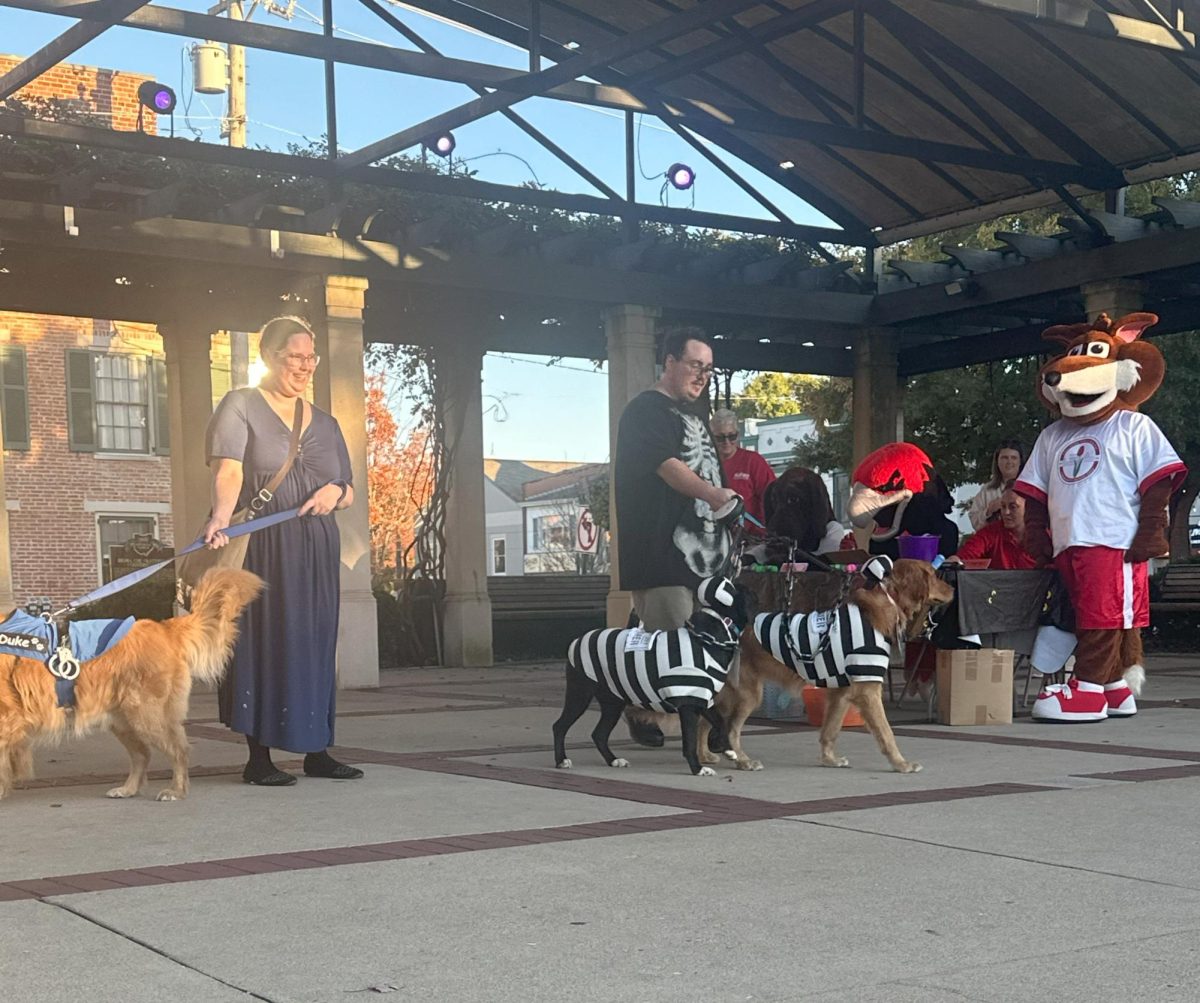 Prisoners or “Pawtners in crime”, Kia and Moonlight, and police officer, Duke, were escorted on stage by owners, Kelley Stidolph and Brandon Meadows.