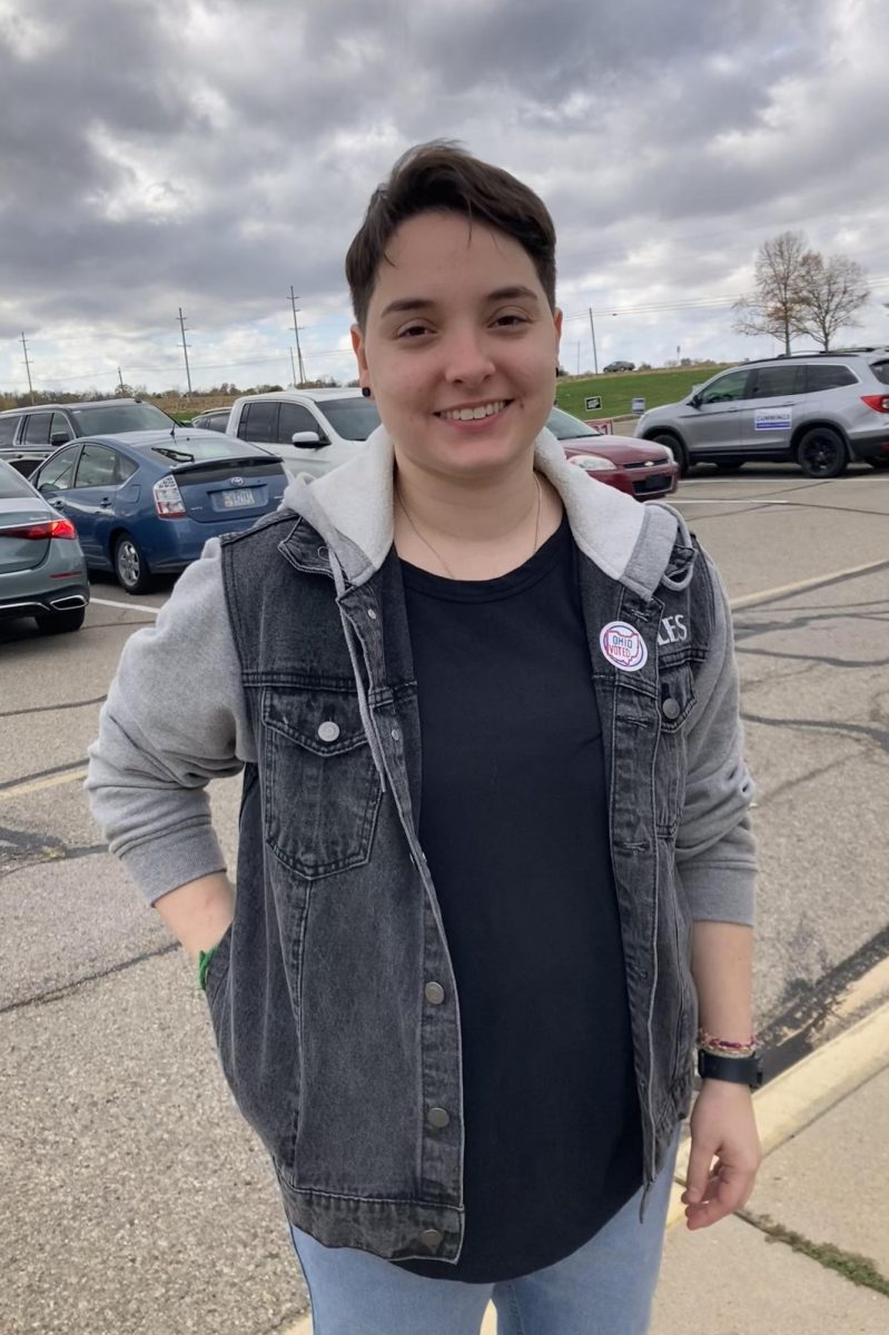 Miami alumni and Oxford resident, Isabella Cicogna, stands outside of Talawanda Middle School after casting her vote. 