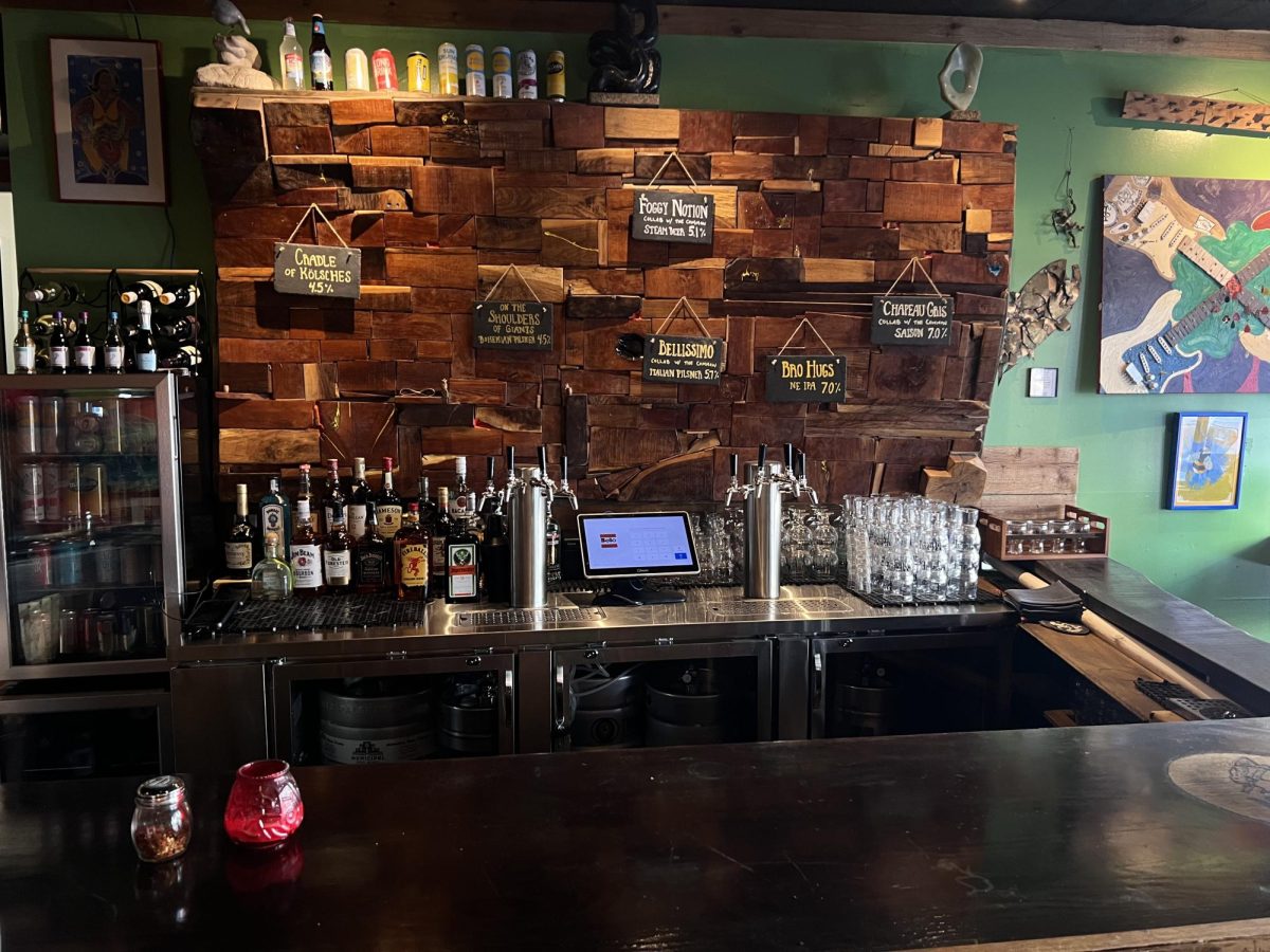 Newly installed bar inside Bello Wood Fired Pizza Studio showcases the drinks available. 
