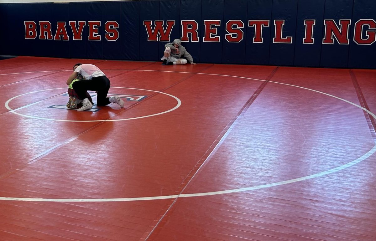 Talawanda girls wrestlers Mikaela Lema and Mili Malohn prepare for OHSAA District Championships
