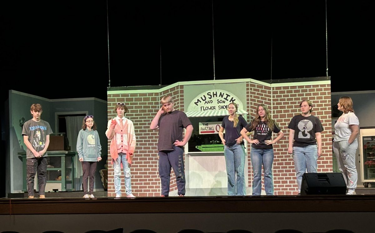 The cast of Talawanda High School’s production of “Little Shop of Horrors” rehearses a group number ahead of opening night.