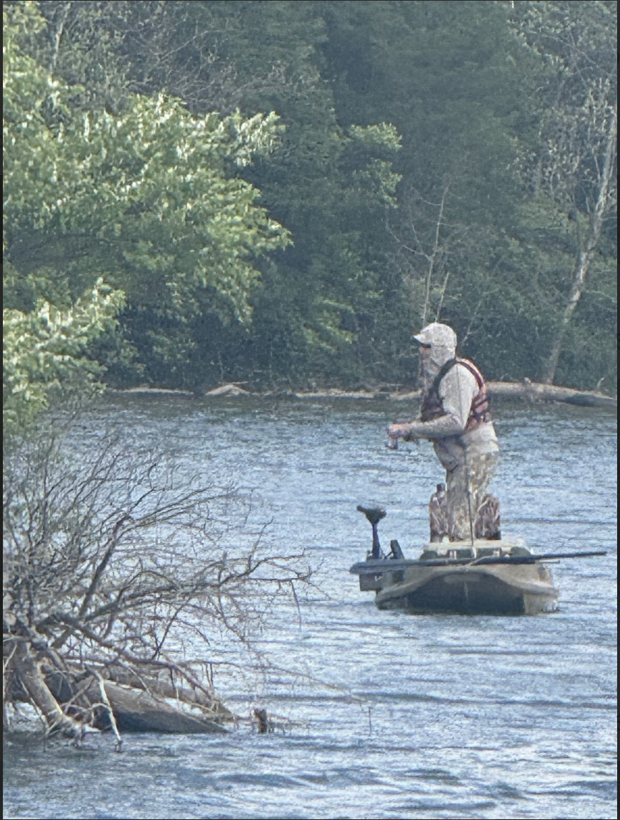 Mark Niebes, 36, fishes off the dock of the Hueston Woods Lodge.